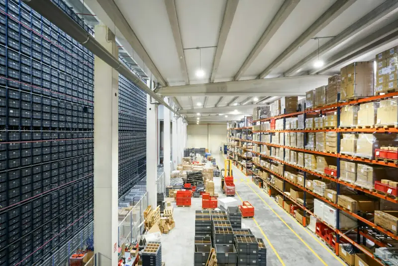 Warehouse aisle with shelving and goods